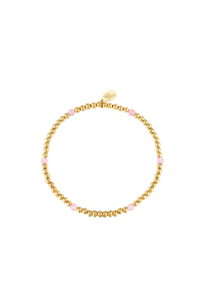 Armband | Gouden armbandje met roze kraaltjes